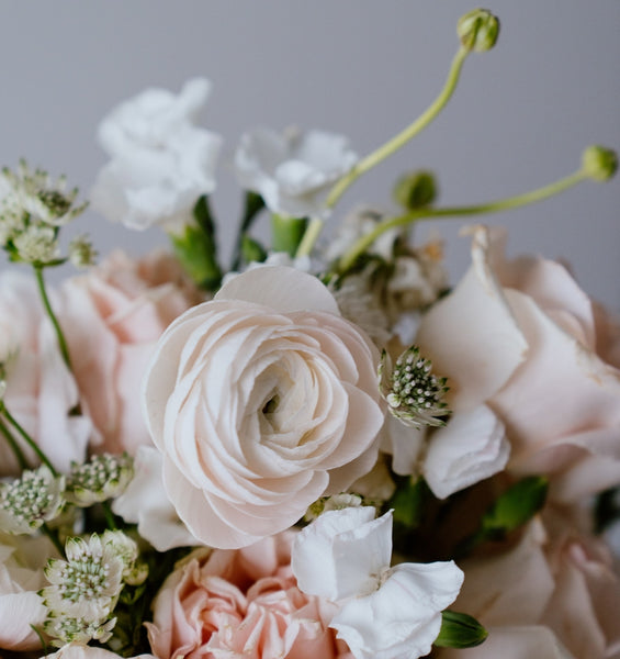 Primary close up of the blush floral wedding package by neil lane