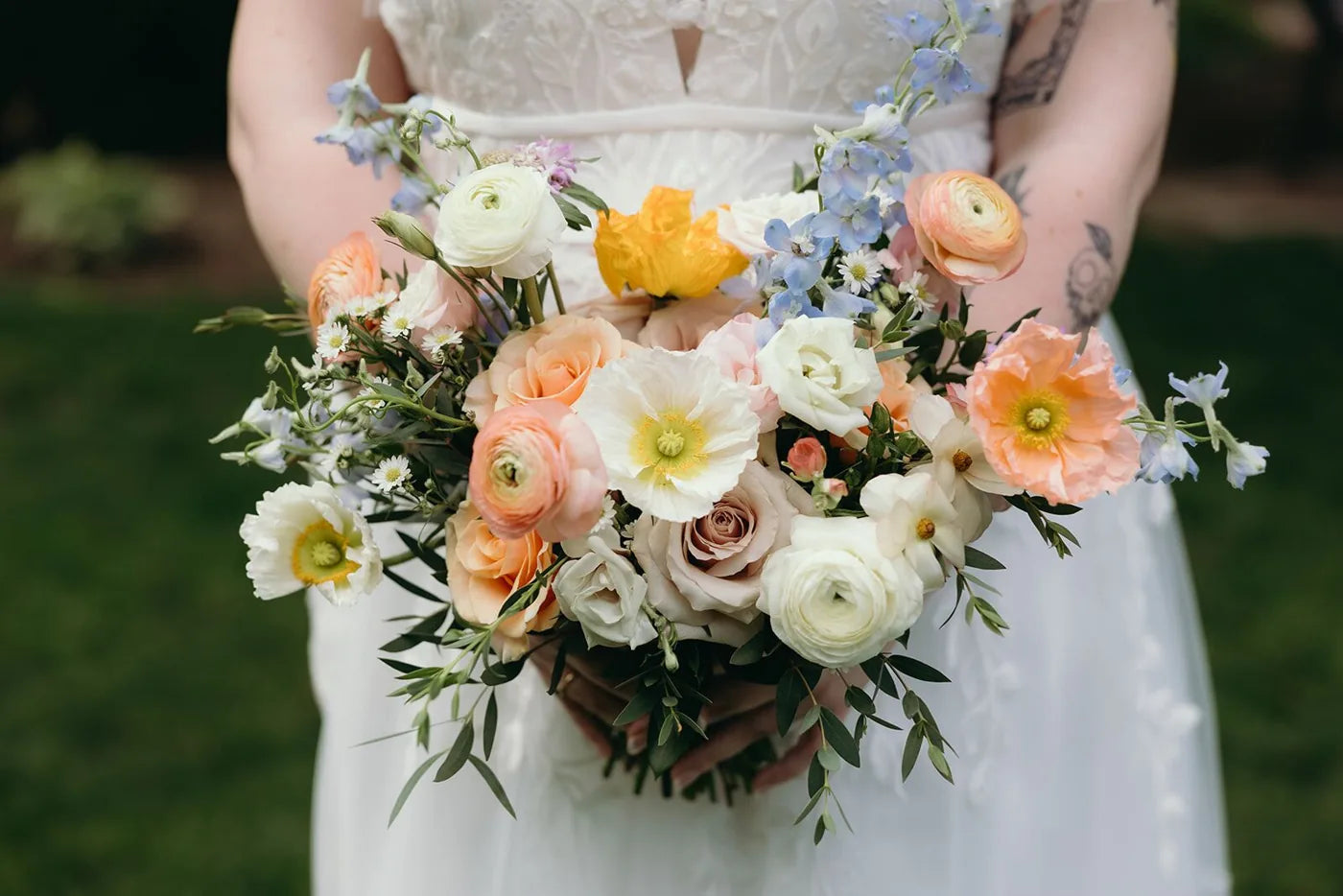 Customer-submitted wedding flower photo from The Knot review by Rachel Podowski.