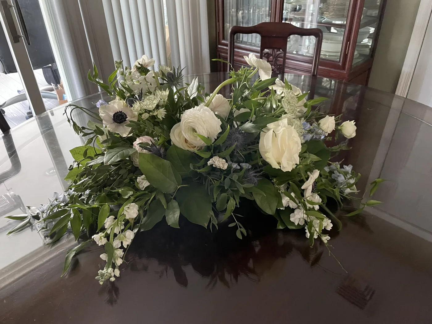 Customer-submitted wedding flower photo from The Knot review by Deepa Varma.