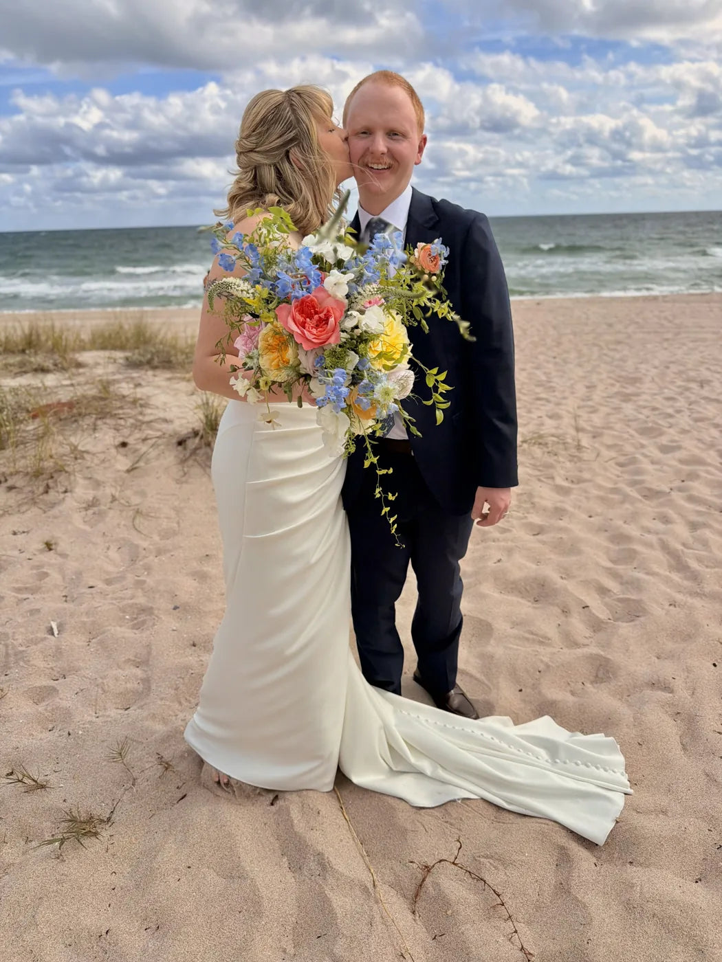 Customer-submitted wedding flower photo from The Knot review by Sophie DeLisle.