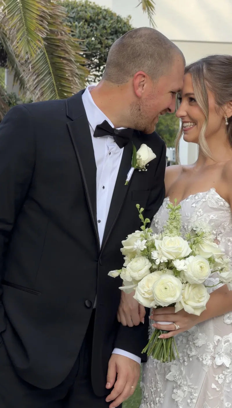 Customer-submitted wedding flower photo from The Knot review by Emily Norell.