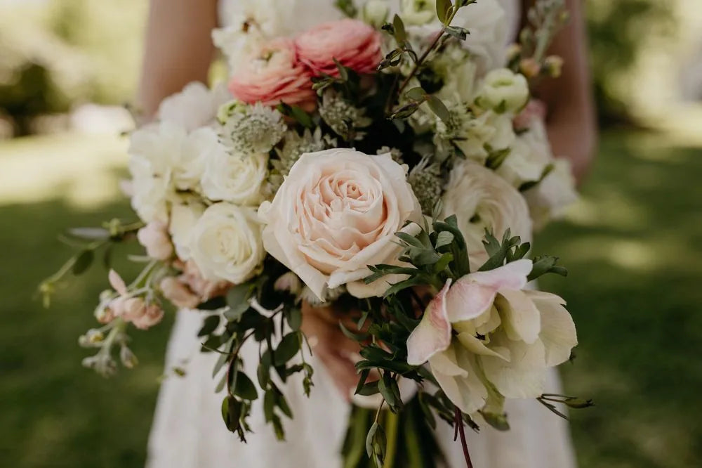 Customer-submitted wedding flower photo from WeddingWire review by Christina.
