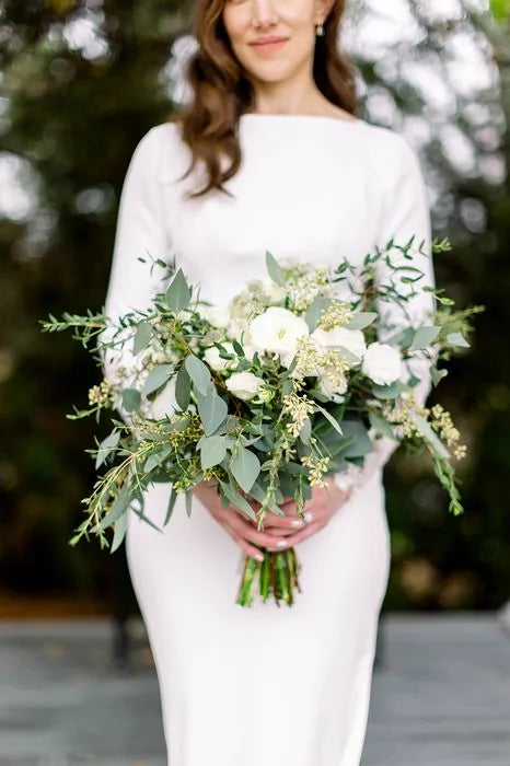 Customer-submitted wedding flower photo from WeddingWire review by Pamela.