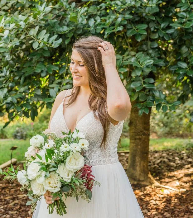 Customer-submitted wedding flower photo from WeddingWire review by Erin.